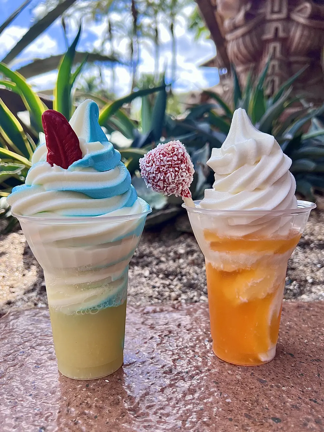 Two colorful DOLE Whip floats